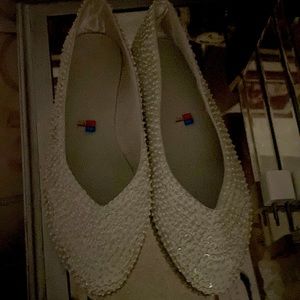 Size 9 1/2 white shoes with sparkles.  Good condition